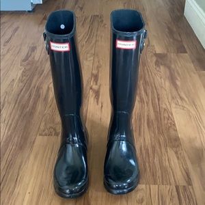 Black tall hunter boots